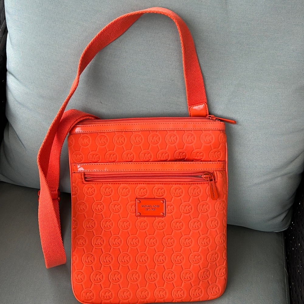 Cross Body embossed neoprene web cross body. Sleek cross body